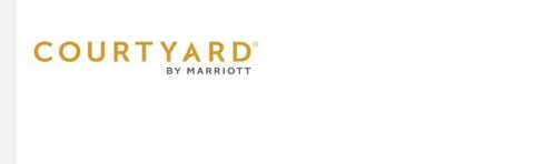 Courtyard by Marriott logo in gold text on white background